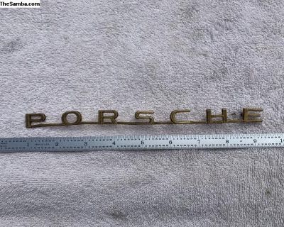 Original emblem, missing 2 pins that can be easily fixed. Has the R logo on the back also.