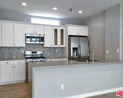 10560 Santa Monica Blvd Apt 205. *PLEASE SEE PRIVATE REMARKS BEFORE CALLING LA1*. A GORGEOUS INTERIOR and EXTERIOR RENOVATION HAS RECENTLY BEEN COMPLETED AT THIS ONE OF A KIND PROPERTY IN AN A+ LOCATION! THIS BEAUTIFUL UNIT FEATURES LUXURIOUS AMENITIES SUCH AS NEWER CABINETRY, STAINLESS STEEL APPLIANCES, QUARTZ COUNTERTOPS WITH DESIGNER LIKE KITCHEN WITH DRAMATIC BACKSPLASH, NEWER FLOORS, FIREP...