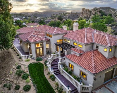 19 Ranchero. Located in the prestigious guard-gated community of Bell Canyon sits this one-of-a-kind spectacular view estate! Follow the long private driveway up to experience the home's true sense of privacy and tranquility. This remarkable residence sets itself apart with its open floor plan, soaring ceilings, and light-filled interior. Through the double-door entryway, you're welcomed into a...