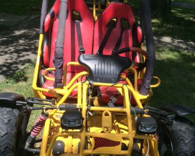 Yellow engine powered buggy