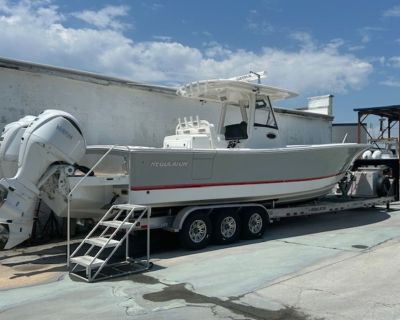 MAJOR PRICE REDUCTION!!!!!!! 2022 Regulator 34CC with Triple Yamaha 300's (330 hours). Boat is fully equipped and ready to Fish! Helm Master. Storm Gray-Kingston Gray sides, t-top color match to hull, RIgid LED Light bar, T-top Rocket Launcher, 20' Carbon FIber Outriggers, Fwd Sun Shade, 3X Tackle Center, Garmin electectronics, Garmin Radar, Yamaha Autopilot, Entertainment Pkg Upgrade, GXM 54, ...