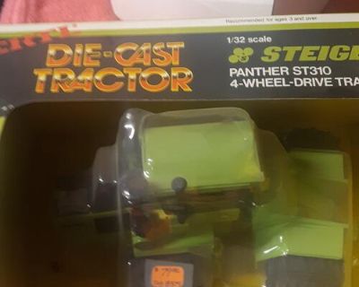 1/32 scale Steiger ST310 box is rough but tractor is in very good condition