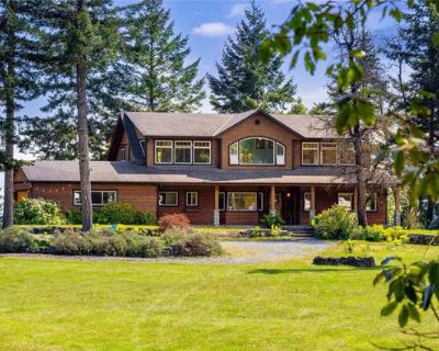 Discover the essence of West Coast living on this stunning 10-acre estate. A forested drive leads you to a 2,100 sq. ft. custom home with sweeping ocean and coastal views. The main level offers an open-concept kitchen, dining, and living space filled with natural light and framed by panoramic vistas. Upstairs, you ll find 3 bedrooms and 3 bathrooms, including a primary retreat with a spa-inspir...