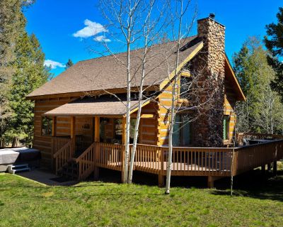 Avg / night: $292. Log cabin in the heart of Woodland Park with hot tub & private sauna | Located in Woodland Park, CO | 4.54 Stars | 2 Bed, 3 Bath | No Pets. No pets. Max 8 guests. This lovely cabin combines rustic comfort with luxury and all the conveniences of home. This custom timber frame log cabin sits neatly on a full city acre in the woods just blocks from downtown Woodland Park in scen...