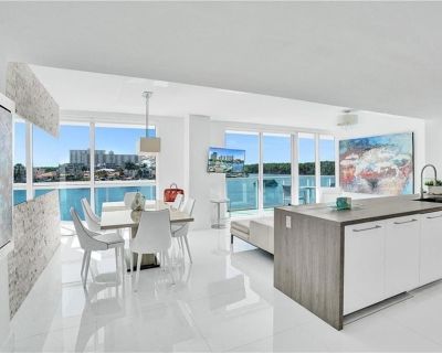 Sunny Isles Blvd. Stunning waterfront condo for seasonal rent with amazing water views from each room! Furnished turnkey unit to enjoy everything South Florida has to offer in the Winter! Open plan kitchen with bright living dining areas. Beautiful ceramic floors, lots of closet space, stylish window coverings, designer furniture. Assigned parking spot just steps from front door! Extra large sh...