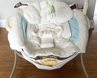 Fisher-Price My Little Lamb Infant Seat Mfr Desc: - Snuggly, soft & comfy Premium, plush fabrics (w/ adorable lamb ear head rest) contour to baby for cuddly support of the head, neck and sides. 8 songs and calming vibrations make it even more soothing. When it s time for play, a little jingle bell lamb & mirror dome overhead engage baby. -- Toy bar easily removes for quick access to baby. - Sec...