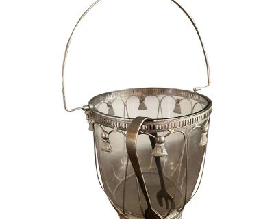 Gorgeous, MCM Cristal ice bucket featuring delicate silver tassels detailing. Nicely footed, and tongs come with it.. Dimensions 8 W 10 D 10 H Styles Mid-Century Modern Period 1960s Country of Origin United Kingdom Item Type Vintage, Antique or Pre-owned Shop Sustainably with Chairish Materials Crystal Condition Good Condition, Original Condition Unaltered, Some Imperfections Color Transparent ...
