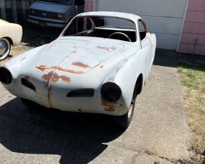 1965 ghia has the pan gray primer.. Been will need new pans. I believe someone decades ago cut a few part of the lower body to repair and never finished it. Overal pretty straight. Some rust , but being that it was in the Oregon no have rot I can see. Any questions please ask. [email protected]