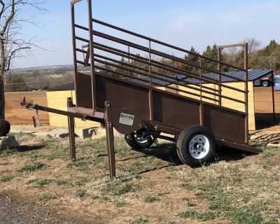 HUGE DEALER DISCOUNTS!!.......Salina Farm Show Special!!!The best loading chute on the market has arrived! This chute has a catwalk, long lasting and proven composite floor, swing away tongue, easy cranking jack system height adjustment, and heavy duty 16 high speed 6,000lb axel. This thing can hold 40 panels too! Ask about our free delivery. Need some panels, a tub, possibly a wheel corral?.Th...