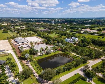 15691 Sunnyland Ln. The ultimate seasonal rental at a premier farm in the gated community of Palm Beach Point.Ideally situated within walking distance of Wellington International, this property boasts exceptional equestrian facilitiesSeasonal Price: $12, 000 per stall for season. Main house $20, 000 per month. Main house 5-bedroom home. 12 stall barns Laundry room. 2 separate feed rooms.2 separ...
