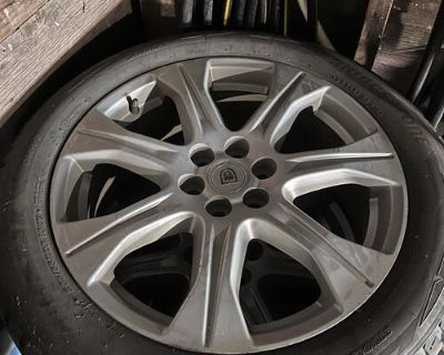 Four (4) Bridgestone Blizzak on 20 OEM Cadillac wheels from an SRX. 235 55R 20.