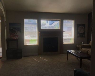 Great house, all guys early to mid twenties. Quiet home in a great neighborhood. Private room, shared bath, washer/dryer on site, and a garage. Move in on May 15.