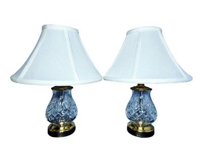 Set of two Waterford Fiona crystal and brass table lamps with an original Waterford white shade. Lamp measures 13 1/2" tall. Minor signs of wear consistent with age.. Dimensions 36 W 36 D 45 L Styles Hollywood Regency Mid-Century Modern Traditional Lamp Shade Included Brand Waterford Period 1990s Country of Origin Ireland Item Type Vintage, Antique or Pre-owned Shop Sustainably with Chairish Ma...