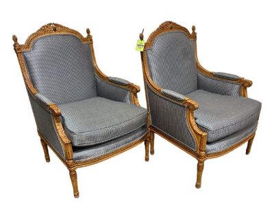 Solid pair of what appear to be hand carved French style Louis chairs that have been reupholstered. I am not sure of age, but you can feel the heavy burlap straps that criss cross underneath the seat which tends to indicate some age. Nothing wrong with the seats or their support. Upholstery is in very good shape. Really usuable as is or easily redone.. Dimensions 27 W 29 D 38 H Styles Louis XVI...
