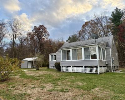 213 Georgetown Rd. Discover the perfect sanctuary for those seeking peace, privacy, and effortless tranquility. This charming two-bedroom, one-and-a-half-bath residence offers a warm and inviting retreat that has been beautifully maintained A highlight of the home is the heated (and ac cooled) sun porch, wrapped in wall-to-wall windows and bathed in natural light-an ideal space to savor year-ro...