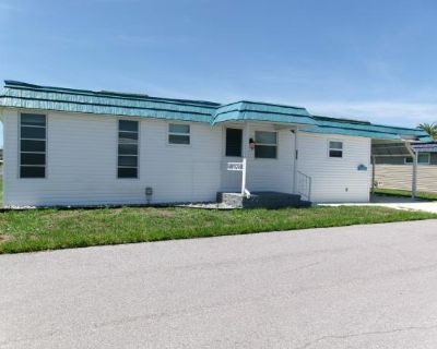 7100 Ulmerton Rd Lot 255. Discover the potential of this 1974 mobile home, measuring 40' x 24' with 2 bedrooms and 2 bathrooms, perfect for those looking to create their dream space. This fixer-upper offers a blank canvas for .... 2 Bedroom. 2 Bathroom. 930 ft