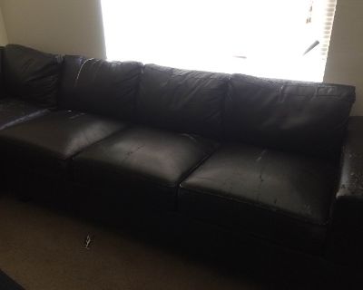 Excellent condition black leather sectional sofa for sale