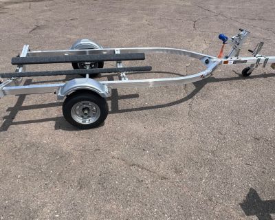 Discover the versatility of the 2025 Triton Single PWC Trailer LTWCI-X. This New Triton trailer ensures easy transport for your watercraft. Ideal for lake trips and weekend adventures, it simplifies your towing experience. Designed for stability and ease, this trailer provides confidence on the road. Its construction supports smooth loading and unloading, making it user-friendly for all enthusi...