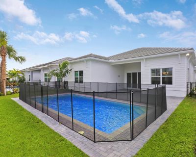 Nautilus Circle. Absolutely stunning ''Sabrina'' Model in the Private, Gated Community of WindGate at Avenir. This Beautifully Maintained 2-year-old Home Features Soaring Volume Ceilings, an Open-Concept layout, and a Desirable Split Floor Plan with 3 bedrooms Plus a Versatile Flex Room--Perfect for a Home Office, Playroom, or Gym. Enjoy Impact Windows, Custom Light Fixtures, and a Designer Kit...