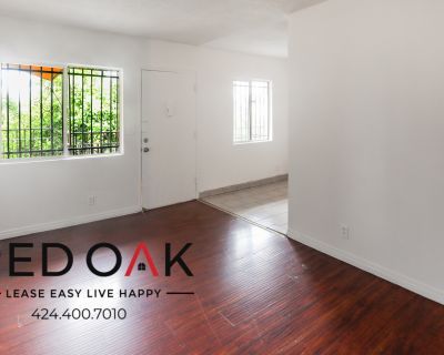 Remarkably Bright Two-Bedroom With Stainless-Steel Appliances, TONS of Natural Light, Ample Storage Space, Gas Furnace, WATER, and PARKING INCLUDED! In Downtown LA!