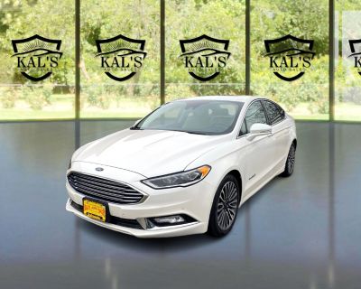 Year: 2018 Make: Ford Model: Fusion Hybrid Trim: Titanium Mileage: 129,211 Trans: Automatic Vin: 3FA6P0RU3JR174292