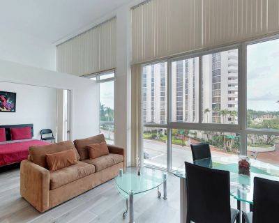 Avg / night: $296. Light-filled condo with beach access and pool, gym, tennis | Located in Miami Beach, FL | 3.7 Stars | 2 Bed, 1 Bath | No Pets. No pets. Max 6 guests. Oceanfront Serenity | Luxe Condo with Beach Access, Pool, Valet Parking & Spectacular Views Welcome to your serene retreat in the heart of Miami Beach, where modern luxury meets classic charm. Nestled within the iconic Castle Be...