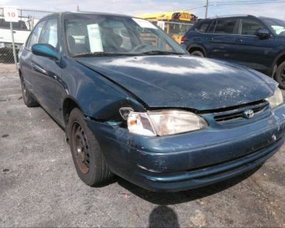 Salvage Blue 1998 Toyota Corolla