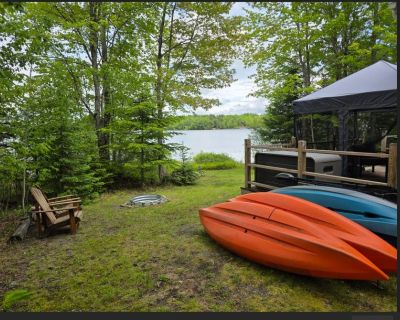 Avg / night: $233. Waterfront home on Graham Lake with kayaks, bikes, firepit & fireplace | Located in Mariaville, ME | 4.86 Stars | 2 Bed, 1 Bath | No Pets. No pets. Max 4 guests. All the hallmarks of a gorgeous stay in Maine await at this inviting, waterfront home on the shores of Graham Lake. This is a place for stunning sunrises, mornings spent paddling in the three provided kayaks, and bli...