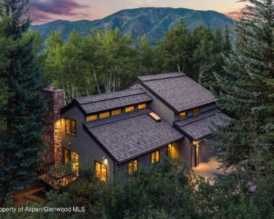 28 Larkspur Ln. Experience refined mountain living in Aspen's coveted Meadowood neighborhood with this elegant six-bedroom residence. Perfectly situated just minutes from the Aspen Recreation Center, Aspen Country Day School, and the Aspen School District campus, this home offers an ideal blend of convenience, comfort, and community. Newly renovated throughout, the home features stylish contemp...