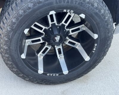 6 lug universal red dirt road wheels with a negative offset. Good wheels and tires still got a lot of life to them