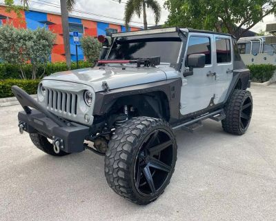 2014 Jeep Wrangler Unlimited Sahara Sport Utility 4D