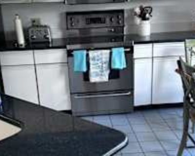 Private room with shared bathroom in a House, Jamestown, RI 02835