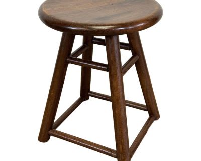 Vintage round dark stained swivel stool or plant stand. Marked as manufactured by a Chicago USA maker. Legs measure beyond width of seat at 13"W. Seat 18.5"H. Solid wood. Natural age wear. Sturdy.. Dimensions 14.75 W 14.75 D 18.5 H Styles Farmhouse Transitional Seat Height 18.5 in Seat Interior Depth 14.75 in Number of Seats 1 Seat Interior Width 14.75 in Period Mid 20th Century Item Type Vinta...