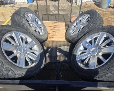 4- 20" Chevy or GM stock rims and tires