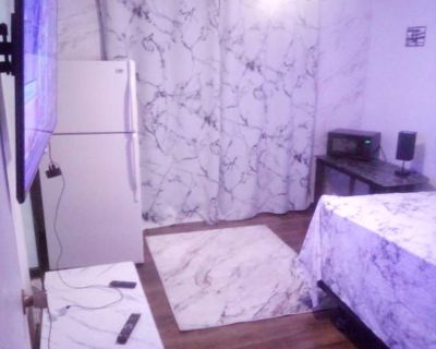 Available on: now. Furnished. Parking available * Internet included * Students welcome * 40+ years welcome. Renting now spacious furnished private master bedroom for rent, featuring its own private bathroom and exclusive amenities. The room boasts a full-size refrigerator, wall-mounted TV with Fire Stick, WiFi, ceiling fan, bed, microwave, and two walk-in closets. Enjoy a peaceful and quiet env...