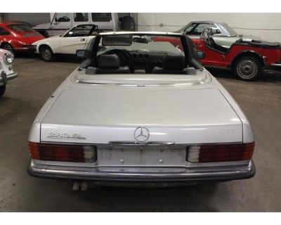 Odometer: 98545. 1985 Mercedes Benz 280SL Roadster EURO model with small bumpers, silver with Black interior, the car had a damage in the front as you can see in the pictures. Interior is all there needs to be redone, black soft top is in good condition. Very solid undercarriage, comes with clean and clear title. An excellent car for restoration. Any questions welcome. Please message or call Fr...