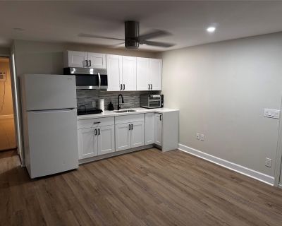 Unit A NE 48th. Amazing 1 bedroom, 1 bathroom apartment in Davie. Amenities included: balcony, central air, deck, hardwood floors, pool, stainless steel appliance, updated kitchen, updated bathroom, washer dryer, and yard. Utilities included: electricity, air conditioning and water. A cat is permitted. Date Available: Nov 18th 2025. $1,800/month rent. $3,600 security deposit required.. 1 Bedroo...