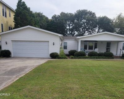 405 Alabama Ave. Enjoy a year at the Beach in this 5 bedroom and 3 bath furnished beach house located on a large corner lot four blocks from the ocean. It boasts of an oversized front porch and spacious deck in the back (Deck is in the process of being updated). Recently updated kitchen with granite counter tops, microwave, dishwasher and trash compactor. Bedrooms and closest are very spacious....