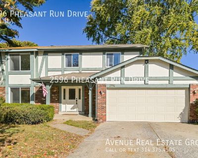 2596 Pheasant Run Drive. Well-kept single-family home with a finished basement that offers additional living space. The screened-in porch is perfect for relaxing or entertaining, overlooking a large private backyard. Inside features a comfortable layout with plenty of natural light and well-maintained finishes throughout. Move-in ready with plenty of space inside and out.. Garage parking, Dogs ...