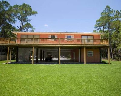 4 Bedroom 3BA 1610 ft Single Family Home For Sale in DAUPHIN ISLAND, AL