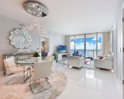 Brickell Ave. Indulge in elevated living at Icon Brickell with this sophisticated 2-bedroom, 2-bathroom residence. Framed by floor-to-ceiling windows, the home offers sweeping bay and skyline views, a sleek open-concept kitchen with premium appliances, and refined contemporary finishes. Residents enjoy world-class amenities, including a spa, infinity-edge pool, fitness center, and renowned dini...