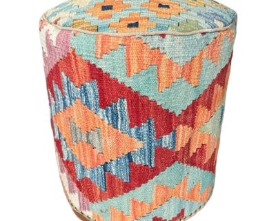 Handwoven Kilim Rug Pouf Ottoman Add global charm and cozy texture to your space with this handwoven Kilim rug pouf ottoman. Crafted from authentic Kilim rug fabric, each piece features vibrant geometric patterns and rich, earthy tones that celebrate traditional weaving artistry. Perfect as extra seating, a footrest, or a decorative accent, this pouf brings warmth and bohemian style to any room...
