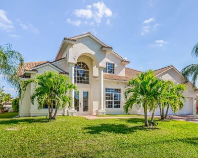 Avg / night: $811. Dog-friendly upscale home with private pool, fishing dock, & central AC | Located in Cape Coral, FL | 4.75 Stars | 4 Bed, 3.5 Bath | Pet-friendly. Dog-friendly. Max 10 guests. Unwind in your own private luxury home, surrounded by palm trees and featuring a pool you can enjoy in all weather! That's right, you can enjoy a swim anytime you want in this home's sparkling private p...