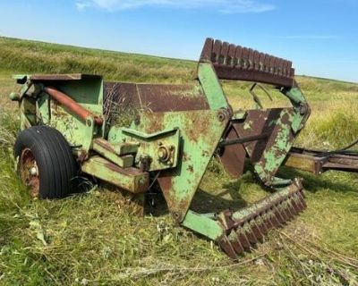 Crown rotary rock picker