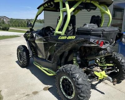 2015 Can-Am Maverick 1000R xds turbo. 1494 miles with 110 hours. Its street
