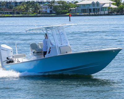 Introducing the exclusive 25' Conch Bay Boat, featuring a powerful Mercury V-10 engine with 400 HP and an advanced Mercury display. This stunning vessel boasts a custom Birdsall hardtop that perfectly matches the hull color underneath. The helm is equipped with two Garmin 8612 touchscreens, power pole switches, a Fusion stereo system, a Mercury display, a compass, and elegant teak accents compl...