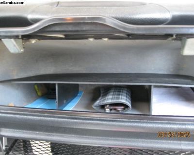 Glove Box Organizer Shelf for Bay Window Box Stock GloveBox (maybe fits aftermarket boxes too?). Made in England. I've used in my Double Door Bay Bus for 2 years now and it does organize the Box. Like new. Made of hardened plastic/vinyl? Black color. Slides right into place. Creates 4 'areas'. 3 small below, and one large on top. Space for Radio in center bottom. thanks jim