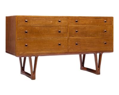 Helge Vestergaard-Jensen for Peder Pedersen Mid Century Sculptural Danish Teak 6 Drawer Dresser This lowboy measures: 56.75 wide x 21 deep x 32.25 inches high Fair Vintage Condition - Stain is Faded on Front and Sides. Wear and Minor Chips Throughout. Drawers Glide Well! Piece is Structurally Solid. ABOUT PHOTOS: We take our photos in a controlled lighting studio to show as much detail as possi...