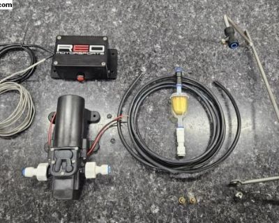 Red-E Motorsports Spraybar Cooling system. This System utilizes thermocouple sensor to activate a cooling pump and cycle it on and off to maintain the desired head temperature. This setup Includes a pushrod tube mounted thermocouple option to read head blowing directly down off the cooling fins of the head, not coupled to the spark plug. This will extend engine life! It is brand new in the box ...