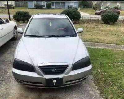 The car is in good condition 
232xxx miles 
Check engine light does occasionally come on but from my understanding and the mechanics that I took it to said itʼs nothing it could just be as simple as a catalytic converter but it effects nothing but Iʼm just giving you a heads up so you know why you see the light it does have a wreck on the back left panel right behind the passenger door but othe...